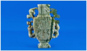 Fine Quality Chinese Green Jade Vase of large size of archaic shape. Both sides of the vase have