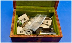 Leather Clad Jewellery Box Containing A Small Collection Of Oddments And Collectables.