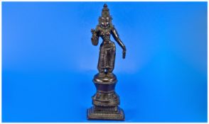 Indian Bronze figure of a Deity, with arms out stretched in a standing pose, mounted on a square