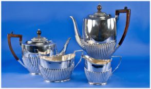 Victorian Elegant Silver 4 Piece Tea And Coffee Service, with fluted half bodies. Comprises tea