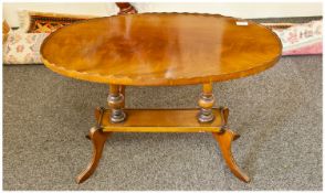 Mahogany Reproduction Tray Top Oval Coffee Table On Pillared Base, Terminating on cabriole legs.