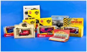 A Collection of 12 Boxed Cars Including Burago, Porsche 911l, Chevrolet, Corvette, Renegade, Jeep,