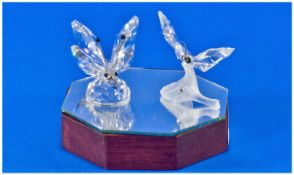 Swarovski Silver Crystal Figures, 2 in total. 1) Butterfly on frosted leaf, metal antennae.