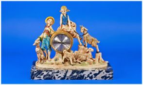 1950`s Decorated Resin Mantle Clock On Marble Base, depicting a girl and boy around a clock face