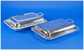 Pair Of Similar Silver Plated Entree Dishes, with lids of oblong shape.