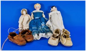 Three Bisque Headed German Type Miniature Dolls in Original Dress. 8, 7 and 5 Inches together with