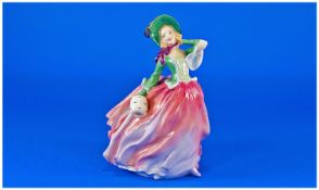 Royal Doulton Early Figure `Autumn Breezes`. HN 1911. Registration number 835666. Designer L.