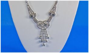 Austrian Crystal Pendant Necklace and Earring Set, the entwined shaped pendant, with a drop below,