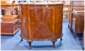 Burr Walnut Demi Lune Shaped 1930`s Side Cabinet with one opening door to front revealing fitted
