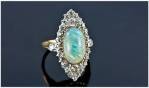Art Deco Fine 18ct Gold Set Diamond and Opal Ring. The single stone opal of good colour. Surrounded