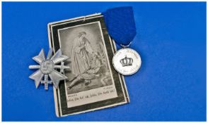 WW2 German Medal and Soldier`s Death Card. Together with German war Merit Cross, with swords.
