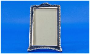 A Silver Photo Frame With Oak Back & Strap. Hallmark Birmingham 1927. 6.5x4``