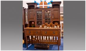 Art Nouveau Style Oak Dresser And Rack. The top rack incorporated with a leaded glass central