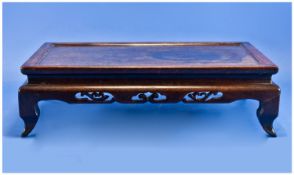 A Fine Quality Chinese Hardwood Stand, probably Hongnu Wood, in a miniature Kang table form
