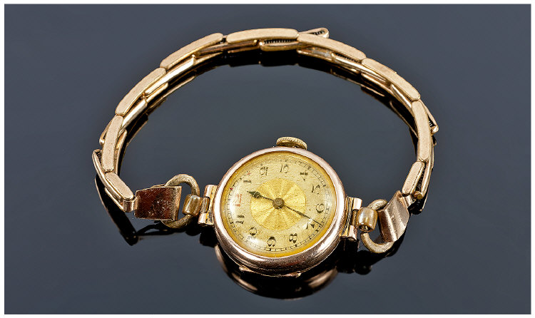 Ladies Art Deco 9ct Gold Cased Wrist Watch. Fitted on a gold plated expanding bracelet. The centre