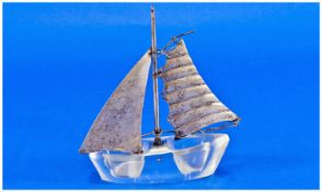 Silver Sails & Glass Bottomed Model Sailing Ship stamped 925 & imported marks. 4.5`` in height.