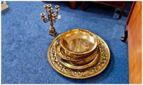 Assortment of Brass comprising various Brass Round Chargers, brass candelabra and polished brass