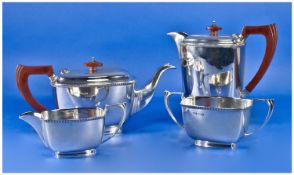 Silver Elegant 4 Piece Tea Service. Comprising of tea pot, water jug, milk and sugar jugs. Hallmark