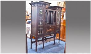 Art Nouveau Inlaid and Glazed Display Cabinet comprising two tall side cabinets, each with a