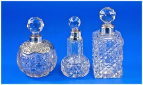 A Collection Of Edwardian Silver Collared Cut Glass Perfume Bottles, 3 in total. Hallmark London
