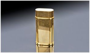 Cartier Quality Gold Plated Petrol Lighter, with original cartier boxes. Ribbed design. 2.5 inches