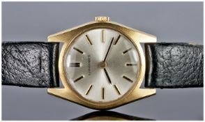 Longines 9ct Gold Cased Ladies Wrist Watch, Manual Wind. Fitted on a black leather strap. With