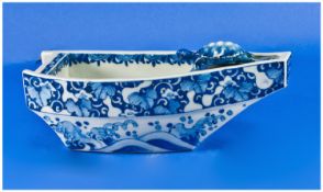 Japanese Blue And White Floral Decorated Vases In The Shape Of A Boat. On the brow of the boat a