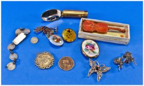 Assorted Costume Jewellery including brooches, compacts and coins.