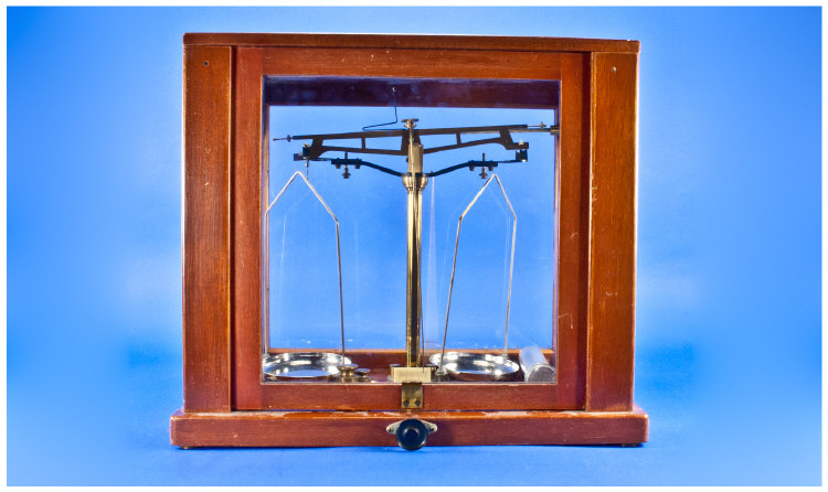 Microid Balance Scales, with a mahogany and glass cabinet. With comprehensive set of brass weights.