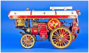 A Well Engineered Red, Cream And Yellow Painted Model Of A Traction Engine, Powered By A Lucas