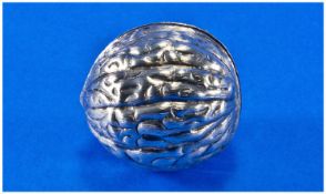 An Unusual Silver Box Realistically Designed As A Walnut. Twists into two halves. Marked sterling.