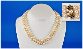 A Fine Quality 3 Strand Pearl Necklace With 9ct Gold, Sapphire And Pearl Clasp. Marked 9ct. 18