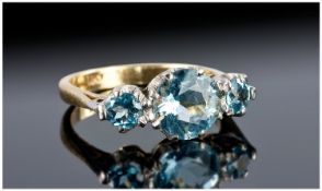 18ct Gold Three Stone Aquamarine & Diamond Ring, Central Round Cut Aquamarine Between Two Smaller