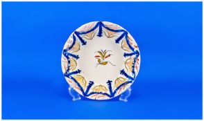 Faience Shallow Dish, naively hand painted central sprig of flowers, bordered to the raised edge