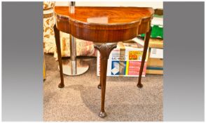 Edwardian Walnut Bombe Front Card Table On Queen Anne Cabriole Legs. The shaped top flap reveals a