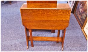 1930`s Small Oak Sutherland Table, with carved slat ends terminating on shaped feet. Height 27