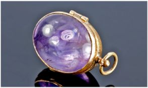 Amethyst Double Sided Egg Shaped Locket, Yellow Metal Mounted.
