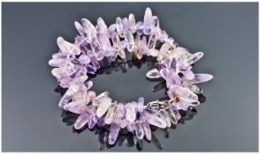 A Bolivian Natural Amethyst Necklace with Silver clasp.