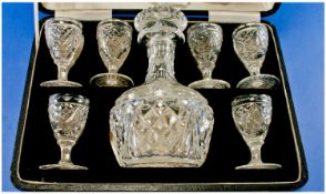 A Fine Boxed Set Of Cut Crystal Drinking Glasses & Decanter. 6 glasses in total. Velvet Interior.
