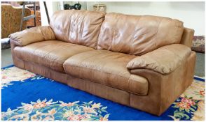 An Italian Style Soft Light Brown Leather Four Seater Twin Cushion Settee of contemporary shape. 7