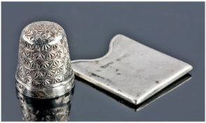 Silver Stamp Box Together With a Thimble.