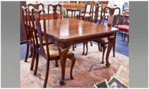 Edwardian Mahogany Cabriole Leg Extending Table with two extra leaves, on a screw wind mechanism (