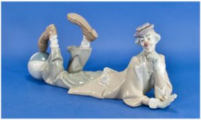 Lladro Figure `Clown`. Model number 4618. Issued 1969. 16.25 inches wide, 6.25 inches high. Mint