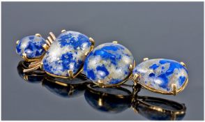 Lapis Lazuli Mounted Brooch, Set With Four Large Polished Stones In A Yellow Metal Unmarked Mount.