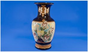 Large Oriental Baluster Vase, sgraffito floral panels to front and back showing enamelled