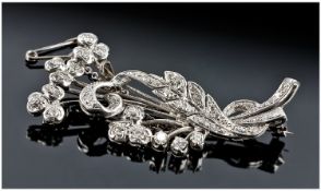 18ct White Gold Diamond Set Spray Brooch, with safety chain. Set with 38 diamonds, 1.25 to 1.50