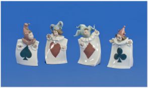 Nao By Lladro Unusual Set Of Four Children`s Figures, each displaying the various playing card