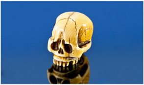 A Very Fine 19th Century Signed Japanese Ivory `Netsuke` In The Form Of A Skull. Signed to back of