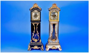 A Pair Of French Decorative Miniature Longcase Clocks with 8 day movement. Each 12.75`` in height.