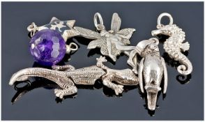 Collection Of Six Silver Charms.